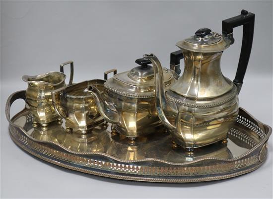 A plated tea set with tray